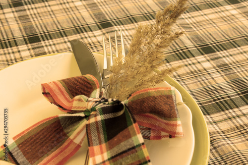 Thanksgiving and Halloween table setting. Table decor elements for traditional autumn holidays. Copy space. Flat layout.
