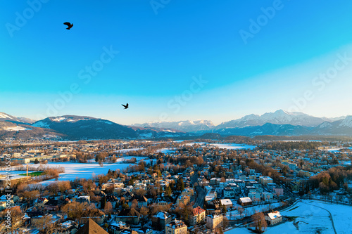 Panorama of Salzburg with snow from Monchsberg hill in Austria. photo