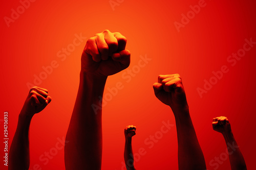 power fist raising in red
