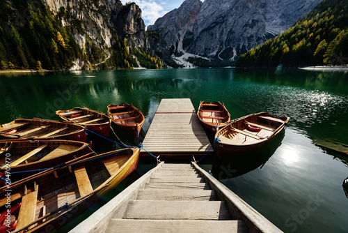 landing stage at a lake with boats