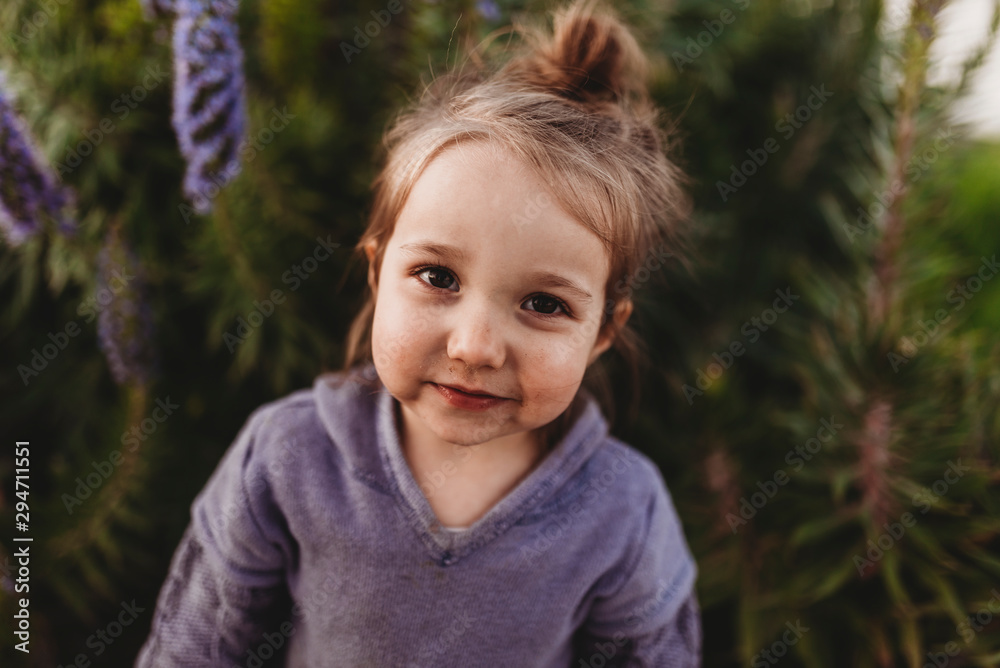 Portrait of little girl with dirty face sweetly smiling Portrait of little girl with dirty face sweetly smiling