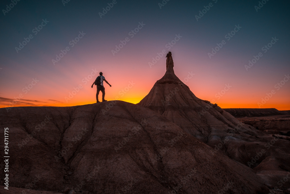 Bardenas reales, Navarra / Spain »; October 4, 2019: A young man on a beautiful sunset in the Bardenas