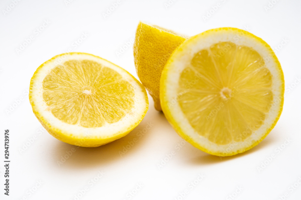  Freshly cut lemon. Sliced ​​lemon on white background.