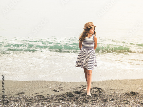 Young girl at the beach photo