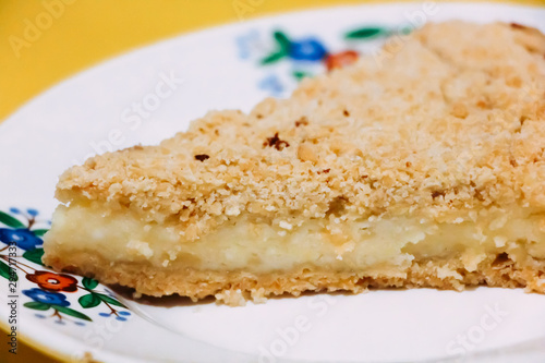 A piece of curd cake from short pastry with a delicate filling