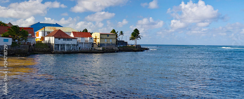 The picturesque coastline of Le Moule town in Guadeloupe, Grande-Terre island, french West Indies