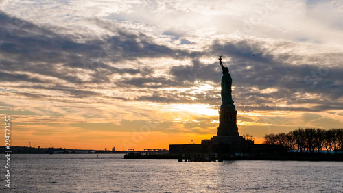 Statue of Liberty during Sunset © Maxime