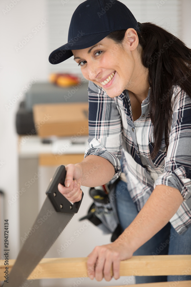 happy young woman during home improvement happy young woman during home improvement