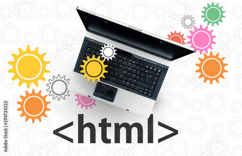 HTML Hyper Text Markup Language. laptop on html tag and gears photo