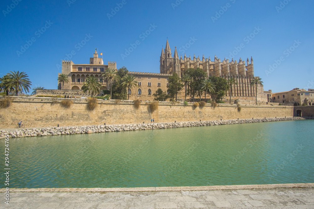 The beautiful Catedral-Basílica de Santa María de Mallorca church in Palma de Mallorca on a sunny day.