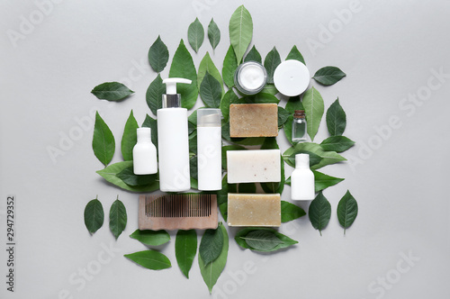Accessories and cosmetics for personal hygiene on light background
