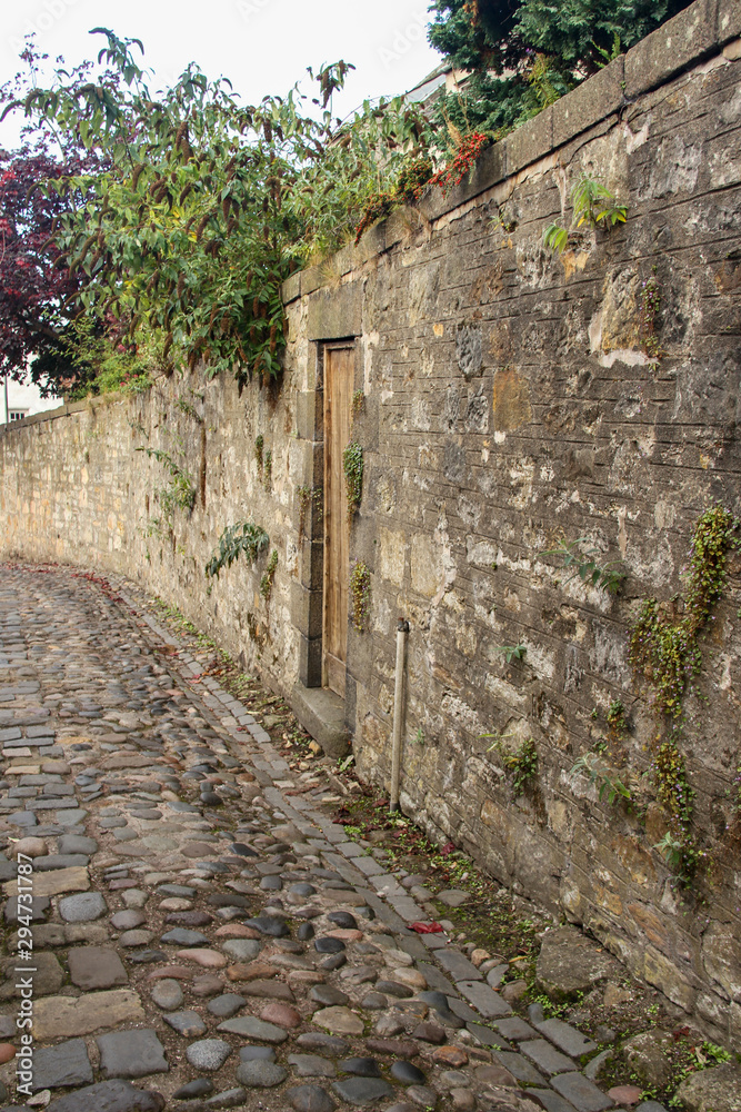 Cobbled Street and Stone Wall in Culross, Scotland