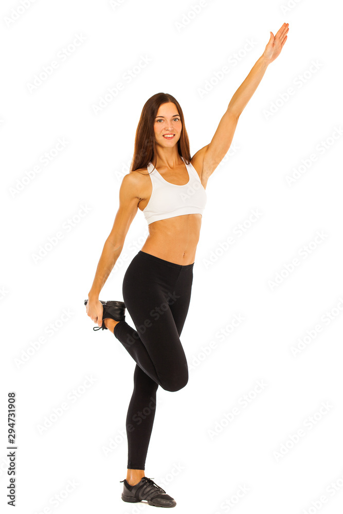 Sexy fitness woman posing in studio - isolated on a white background