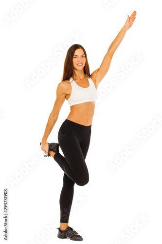 Fototapeta Naklejka Na Ścianę i Meble -  Sexy fitness woman posing in studio - isolated on a white background