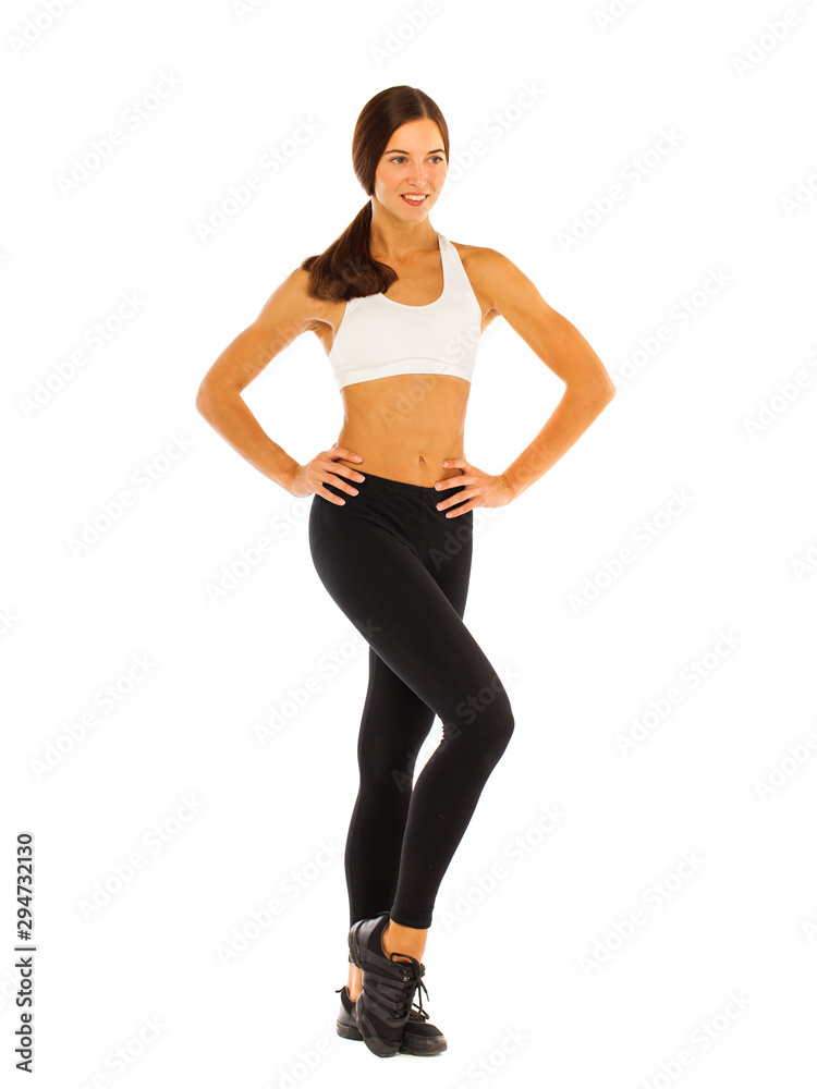 Sexy fitness woman posing in studio - isolated on a white background Sexy fitness woman posing in studio - isolated on a white background