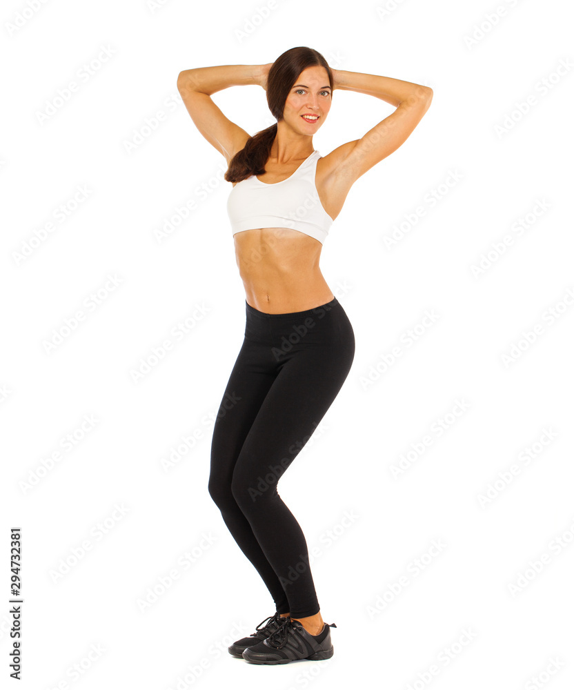 Sexy fitness woman posing in studio - isolated on a white background Sexy fitness woman posing in studio - isolated on a white background