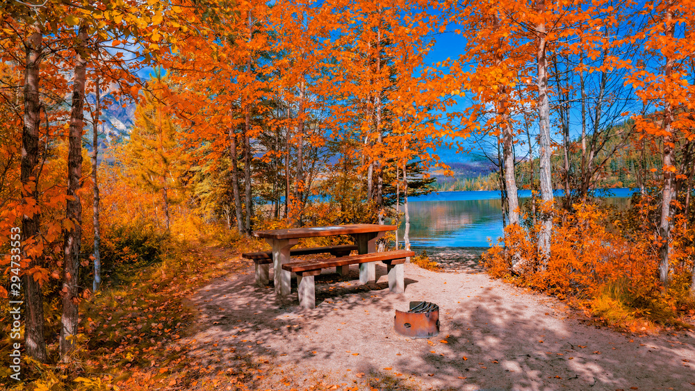 Lakeside Picnic Area In Autumn With Colorful Fall Leaves