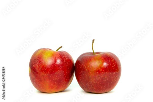 Red apples isolated on a white background. The concept of eating fruit, eating meals with vitamins. Taking care of yourself, diet. Healthy food, apples, pears.
