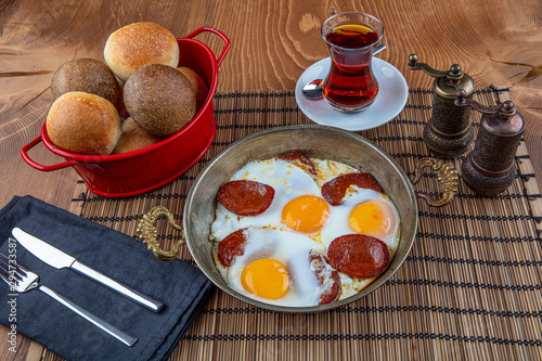 Sausage Fried Egg, sucuklu yumurta from top view ,  turkish sauage with egg omelette. photo