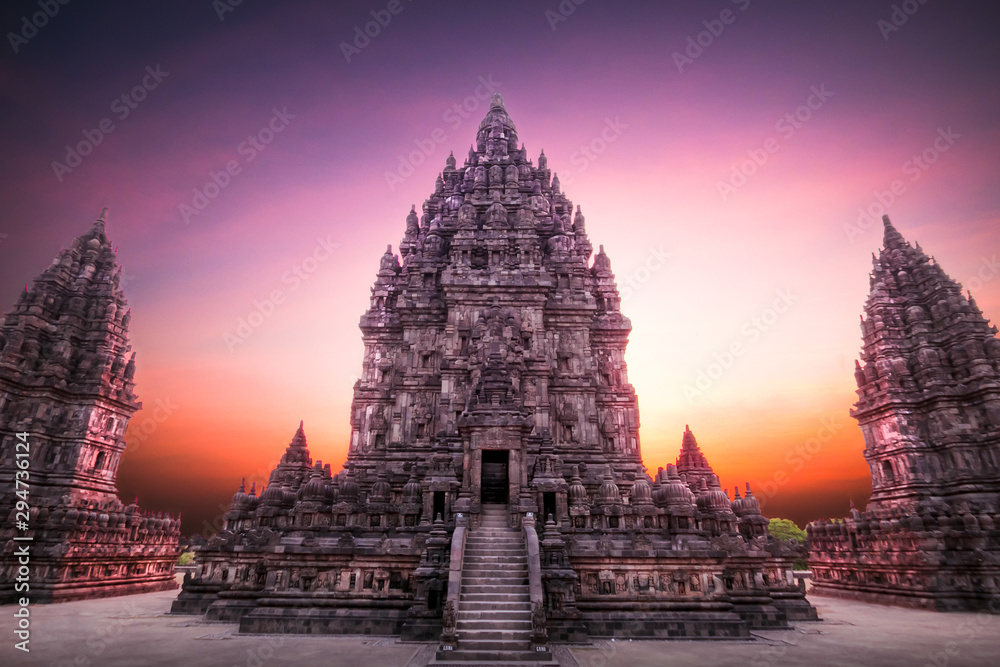 Beautiful sunset at Prambanan (Hindu temple) in Yogyakarta, Java, Indonesia - obrazy, fototapety, plakaty 