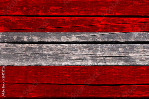 photograph of the beautiful colored national flag of the modern state of Austria on textured fabric, concept of tourism, economics and politics, close-up