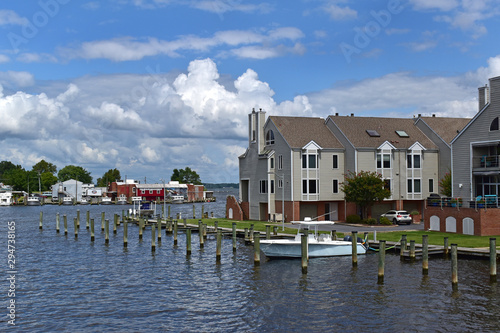 Boats and residences on the Choptank river in Cambridge MD photo