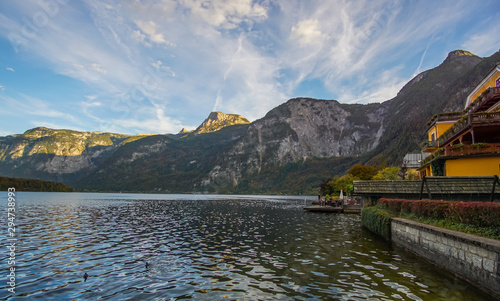  The beautiful lake at the famous village of Hallstatt in Austria. This lake is surrendered by mountains and the village located on its shore. 