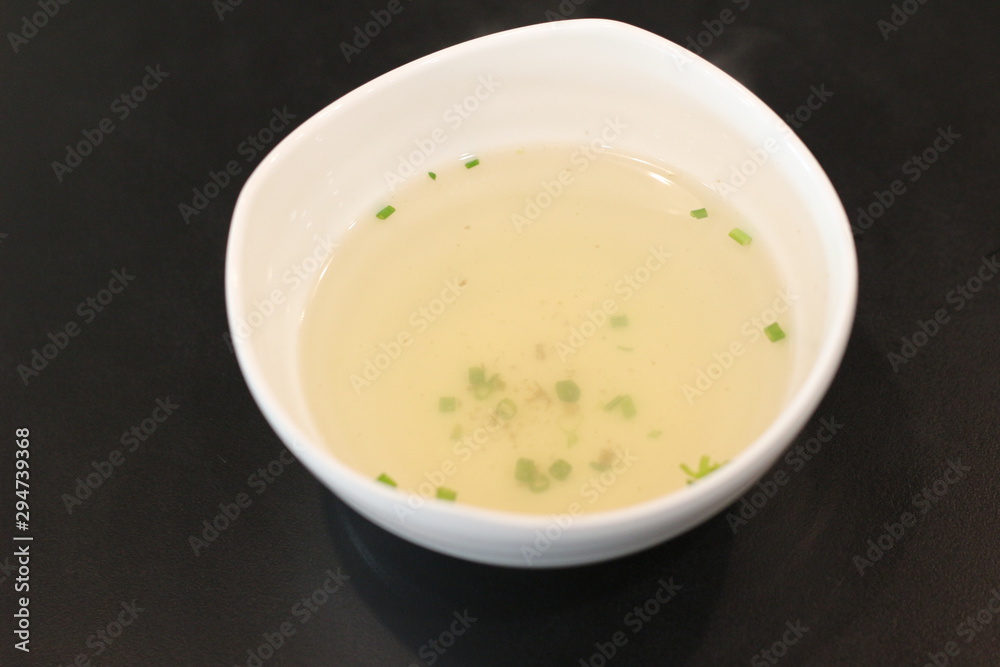 White cup with immersing water for quenching White cup with immersing water for quenching