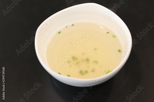 White cup with immersing water for quenching
