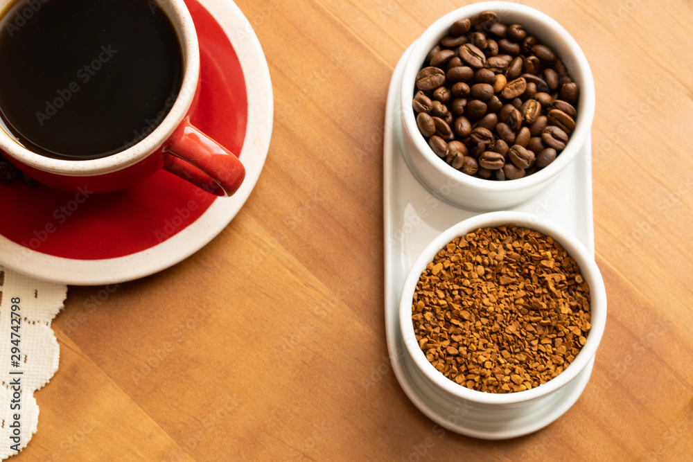 Beans, ground coffee and coffee in a cup Beans, ground coffee and coffee in a cup
