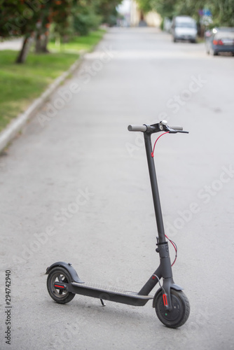 Electric Scooters on the Sidewalk. Convenient electric vehicles for quick movement around the city.