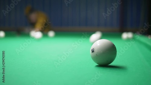 Wallpaper Mural man plays billiards. the concept of billiards, hobbies, sports Torontodigital.ca