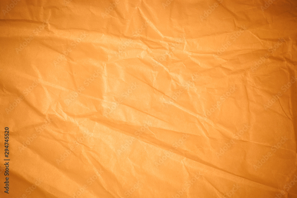 Fototapeta premium Brown crumpled paper background.