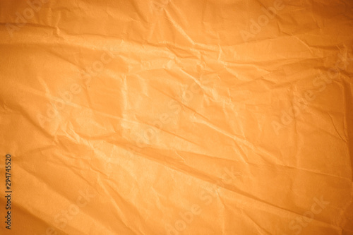 Brown crumpled paper background.