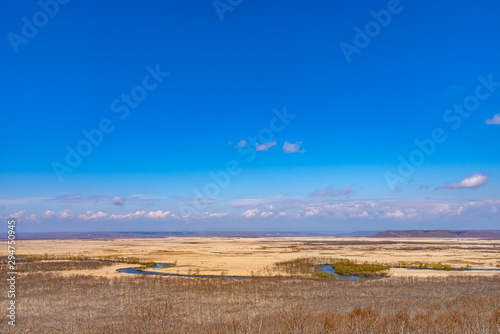 Kushiro Shitsugen national park in Hokkaido in spring day, view from Hosooka observation deck, the largest wetland in Japan. The park is known for its wetlands ecosystems