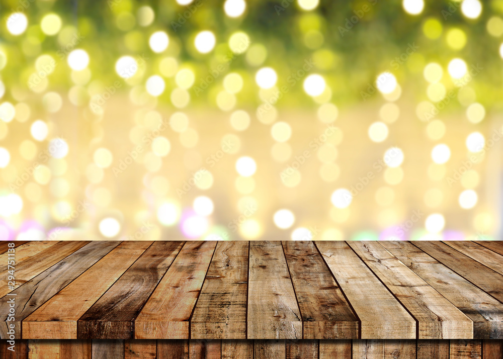 Floor of wooden table and Christmas bokeh background. Floor of wooden table and Christmas bokeh background.