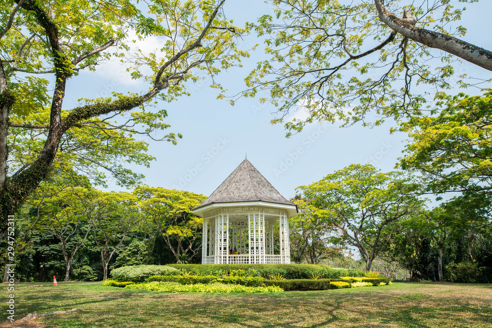 Beautiful pavilion In a garden full of green trees Beautiful pavilion In a garden full of green trees