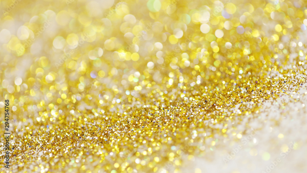 Lights on gold with star bokeh background.Gold celebration background for anniversary, New Year Eve, Christmas, falling coins, wedding or birthday Lights on gold with star bokeh background.Gold celebration background for anniversary, New Year Eve, Christmas, falling coins, wedding or birthday