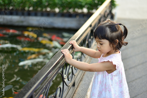 Little Girl and Mom Happy and Smile at The Garden © arleekhan