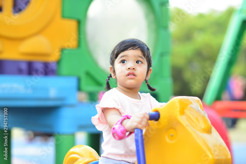 Little Child Girl and Mother Portrait with Playground at Chaloem Golden Jubilee Public Park Bangkok Thailand