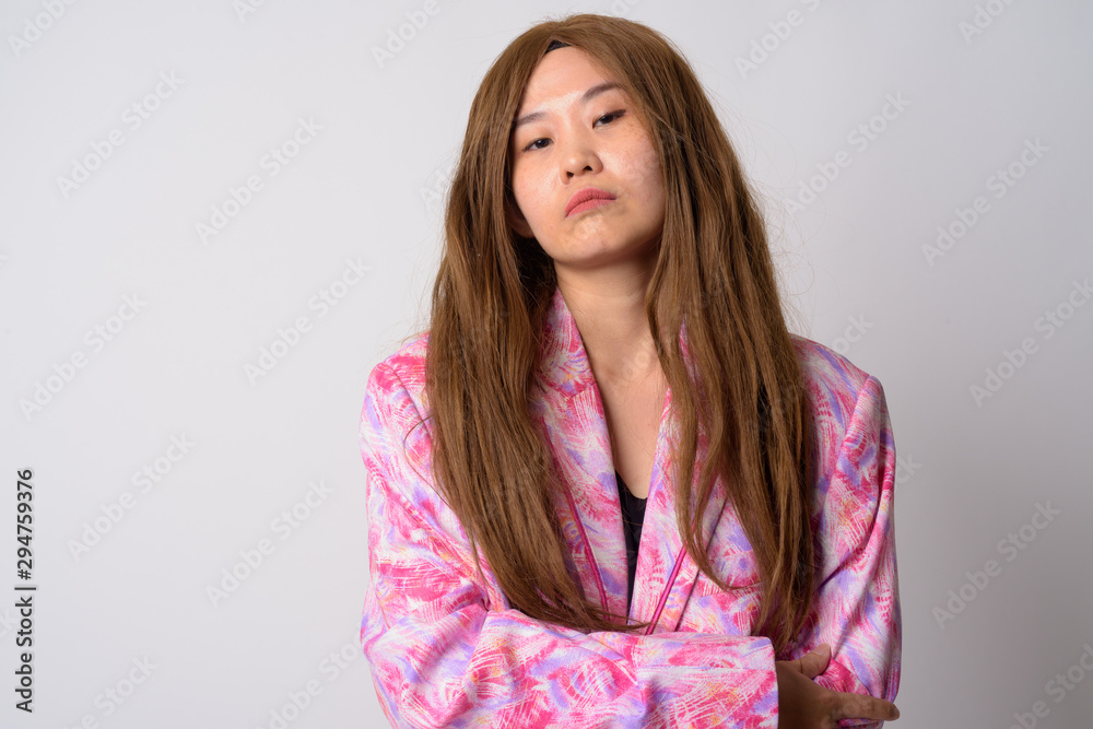 Portrait of businesswoman with wig looking at camera Portrait of businesswoman with wig looking at camera