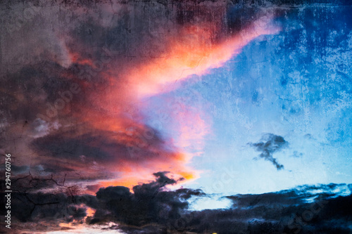 evening sky with old grunge wall crack texture overlay like painting for