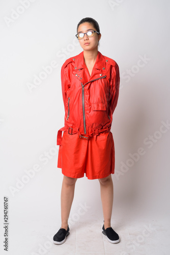 Full body shot of young Asian rebellious woman