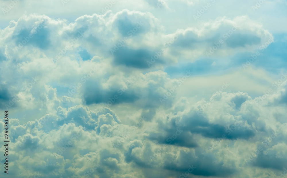 Beautiful blue sky and white cumulus clouds abstract background. Cloudscape background. Blue sky and fluffy white clouds on sunny day. Nature weather. Bright day sky for happy day background.