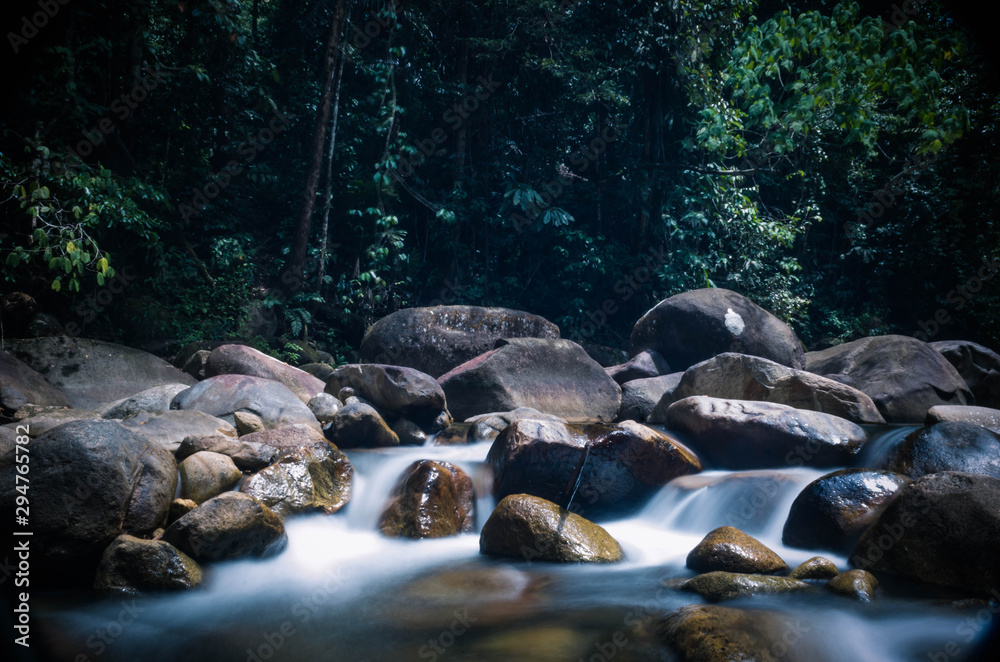 Long exposure shots of stream with cascades. Long exposure shots of stream with cascades.