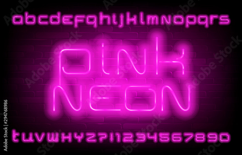 Pink Neon alphabet font. Neon light modern letters and numbers on brick wall background. Stock vector typescript for your typography design.