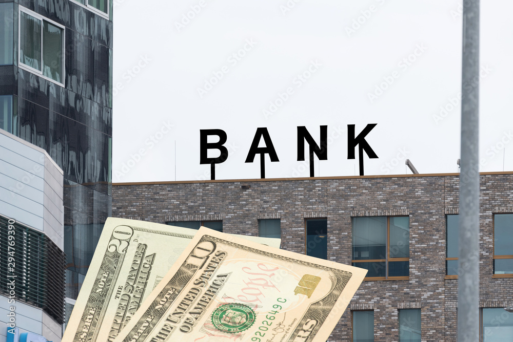Eine Bank und Dollar Geldscheine Eine Bank und Dollar Geldscheine