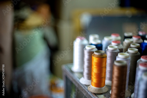 Many roll of bobbin thread colourful