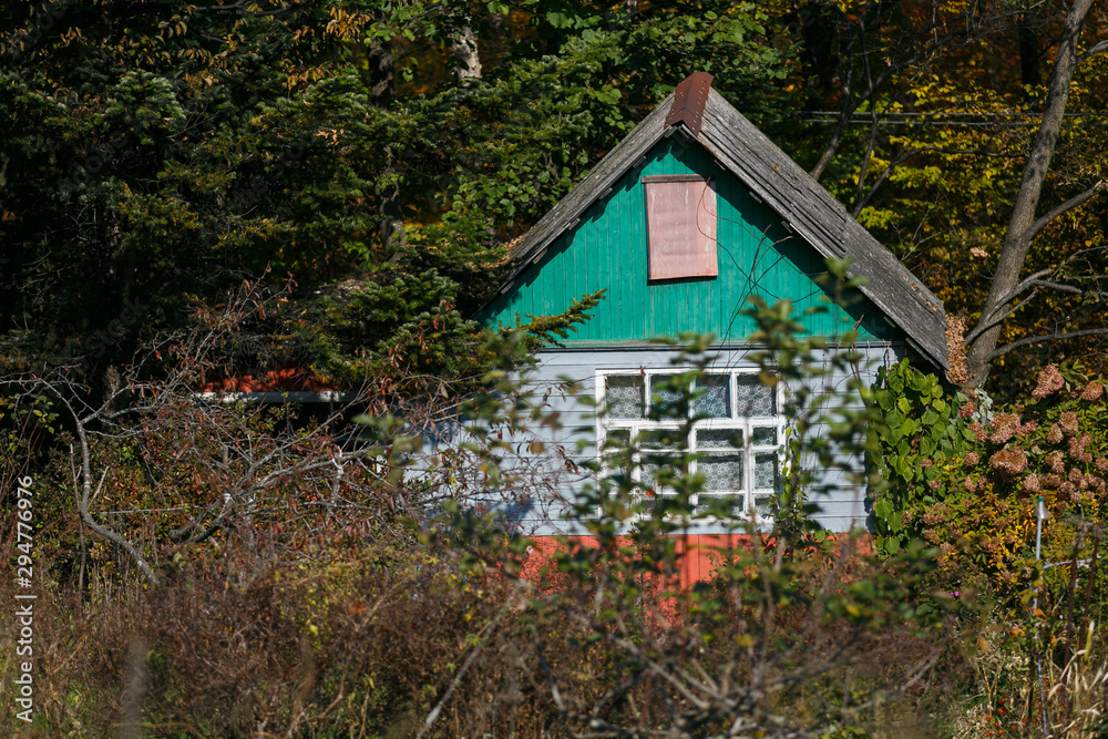 Beautiful country house behind a high fence. Chic cottage in a holiday village. Beautiful country house behind a high fence. Chic cottage in a holiday village.