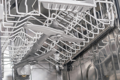 basket for dishes inside the dishwasher, close-up